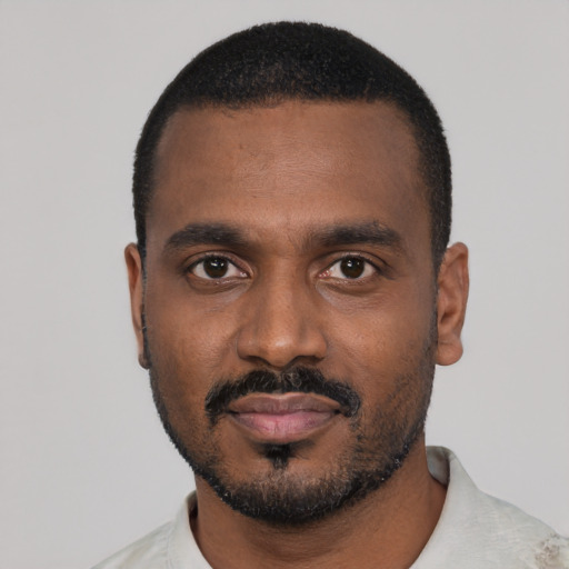 Neutral black young-adult male with short  black hair and brown eyes