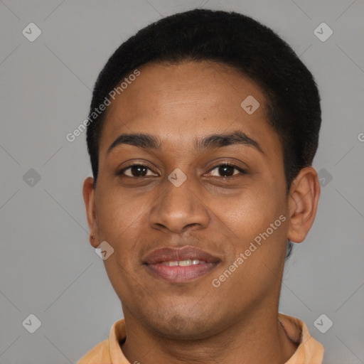 Joyful black young-adult male with short  brown hair and brown eyes