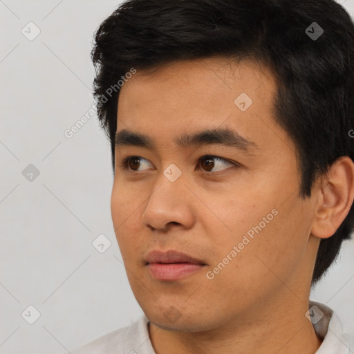 Neutral asian young-adult male with short  black hair and brown eyes