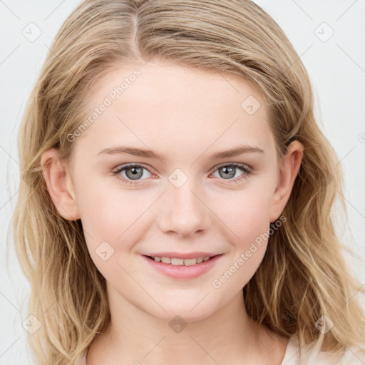 Joyful white young-adult female with long  brown hair and blue eyes