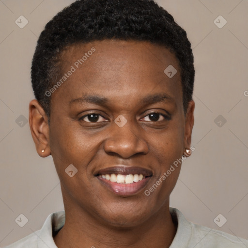 Joyful black young-adult male with short  brown hair and brown eyes