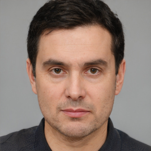 Neutral white adult male with short  brown hair and brown eyes