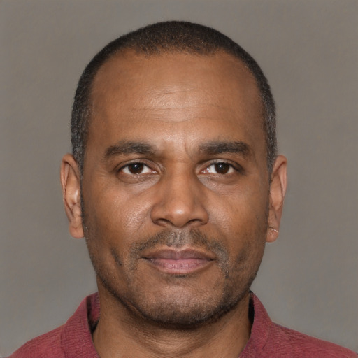 Neutral latino adult male with short  brown hair and brown eyes