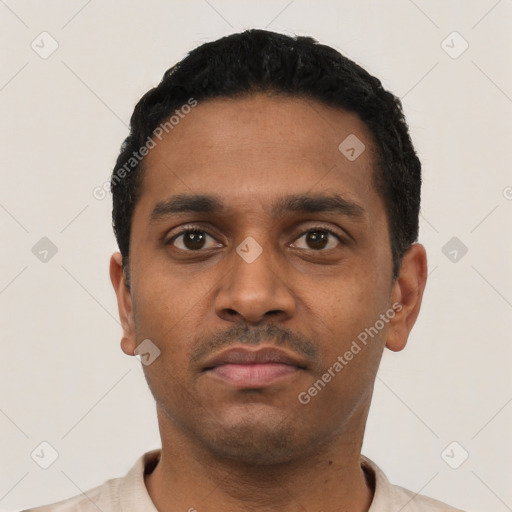 Neutral black young-adult male with short  black hair and brown eyes