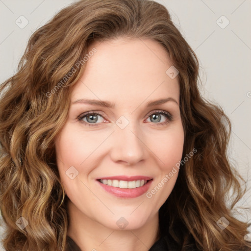 Joyful white young-adult female with long  brown hair and green eyes