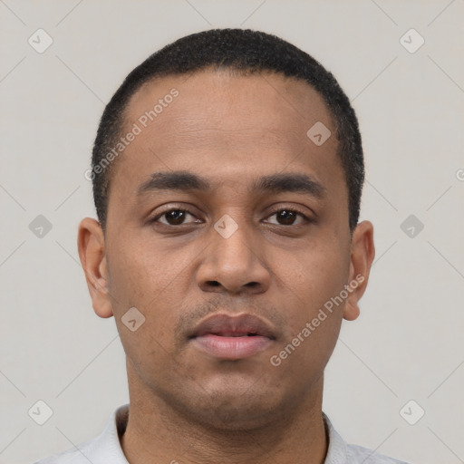 Neutral latino young-adult male with short  black hair and brown eyes
