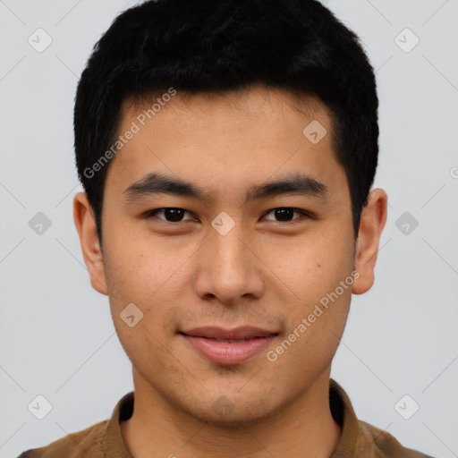 Joyful asian young-adult male with short  black hair and brown eyes