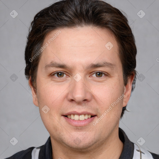 Joyful white adult male with short  brown hair and grey eyes