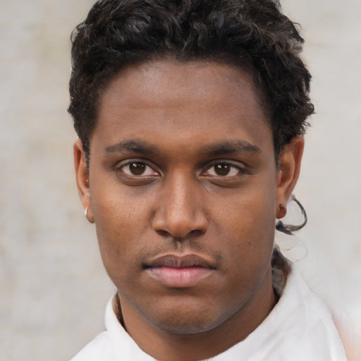 Neutral black young-adult male with short  brown hair and brown eyes