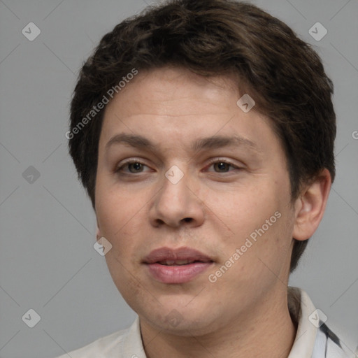 Joyful white adult female with short  brown hair and brown eyes