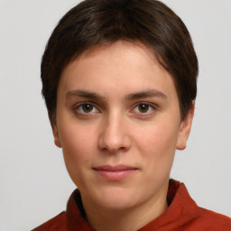 Neutral white young-adult female with short  brown hair and brown eyes