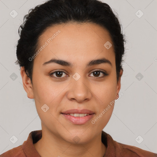 Joyful latino young-adult female with short  black hair and brown eyes