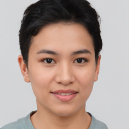 Joyful asian young-adult female with short  brown hair and brown eyes