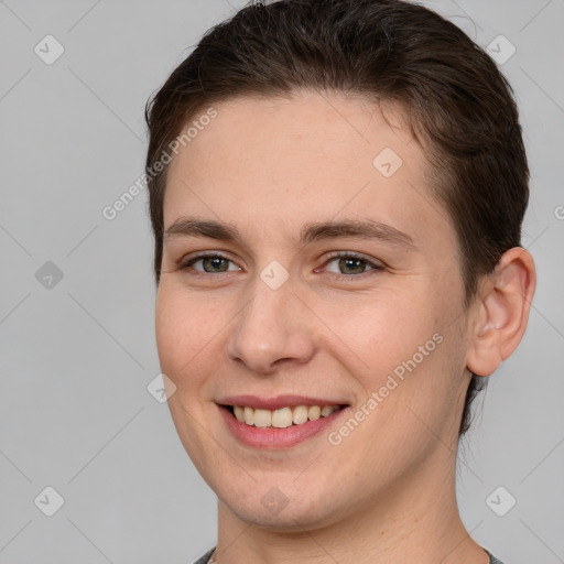 Joyful white young-adult female with short  brown hair and brown eyes