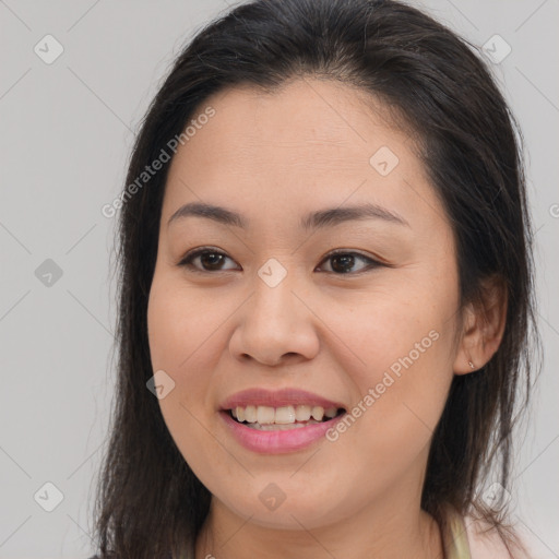 Joyful white young-adult female with long  brown hair and brown eyes