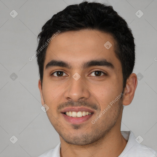 Joyful latino young-adult male with short  black hair and brown eyes