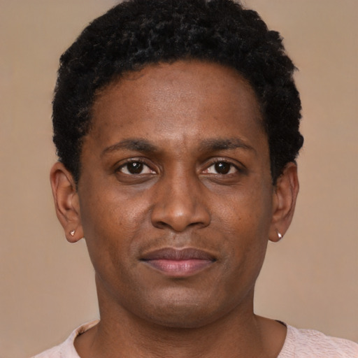 Neutral latino young-adult male with short  brown hair and brown eyes