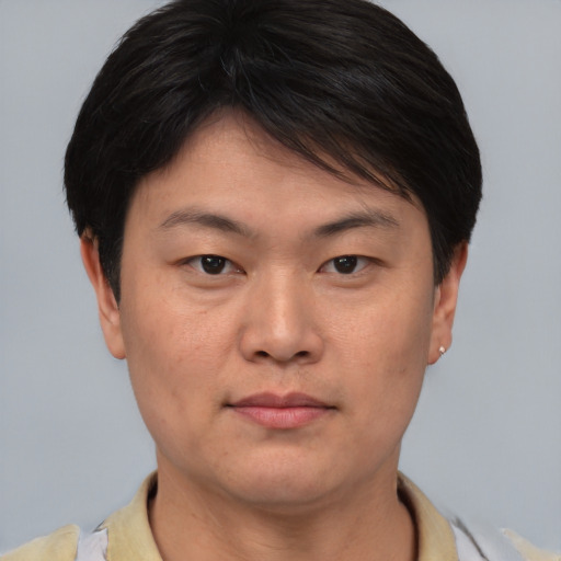Neutral asian young-adult male with short  brown hair and brown eyes