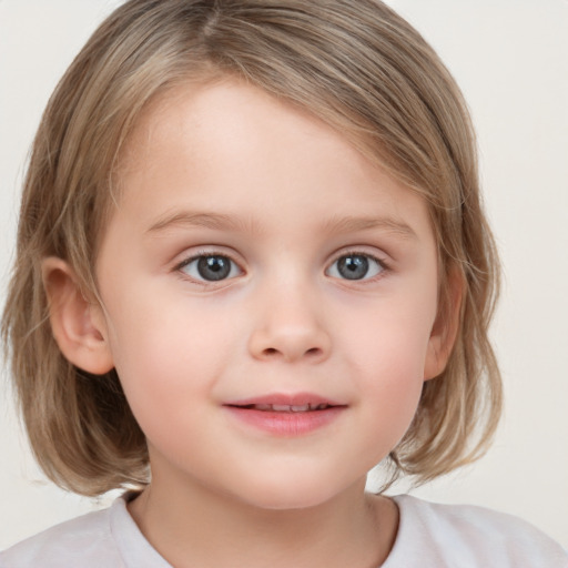 Joyful white child female with medium  brown hair and grey eyes