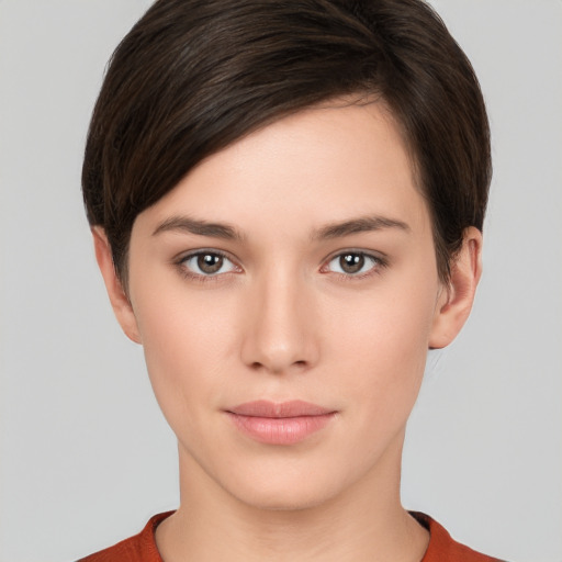 Neutral white young-adult female with short  brown hair and brown eyes