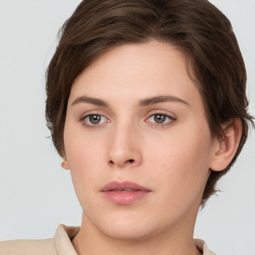 Neutral white young-adult female with medium  brown hair and brown eyes