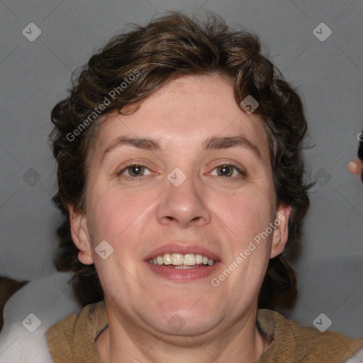 Joyful white adult female with medium  brown hair and blue eyes