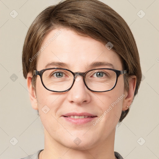 Joyful white adult female with short  brown hair and grey eyes