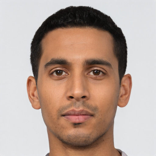 Neutral latino young-adult male with short  black hair and brown eyes