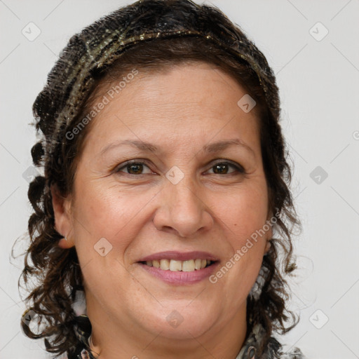 Joyful white adult female with long  brown hair and brown eyes