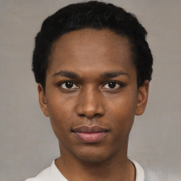 Neutral black young-adult male with short  black hair and brown eyes