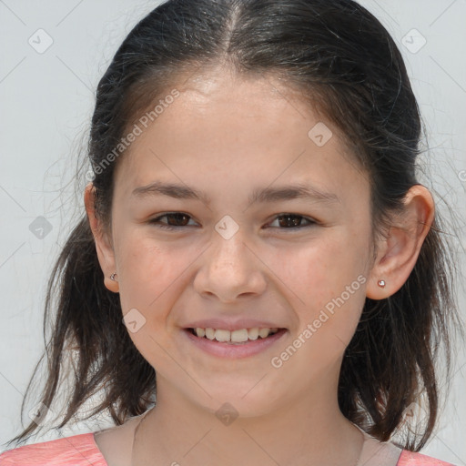 Joyful white child female with medium  brown hair and brown eyes