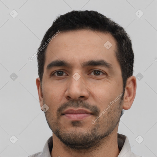 Neutral latino young-adult male with short  black hair and brown eyes