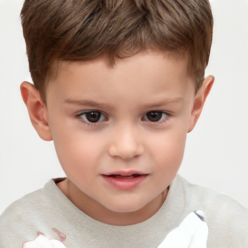 Joyful white child male with short  brown hair and brown eyes