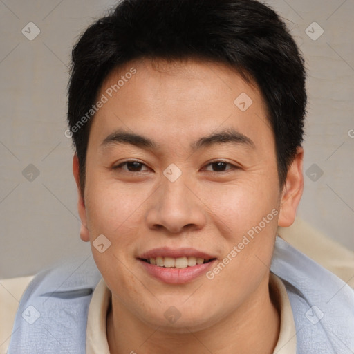 Joyful asian young-adult male with short  brown hair and brown eyes