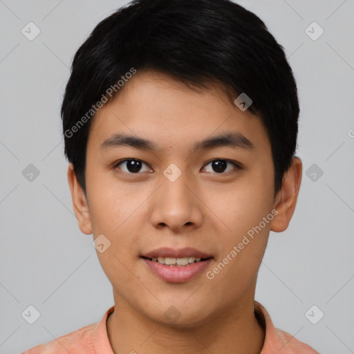 Joyful asian young-adult male with short  black hair and brown eyes