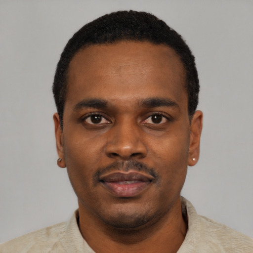 Neutral black young-adult male with short  black hair and brown eyes