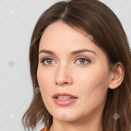 Neutral white young-adult female with long  brown hair and brown eyes