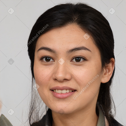 Joyful white young-adult female with medium  brown hair and brown eyes