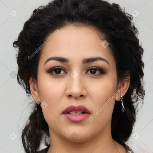 Joyful latino young-adult female with medium  black hair and brown eyes