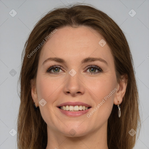 Joyful white young-adult female with long  brown hair and green eyes