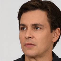 Neutral white adult male with short  brown hair and brown eyes