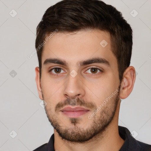 Neutral white young-adult male with short  brown hair and brown eyes