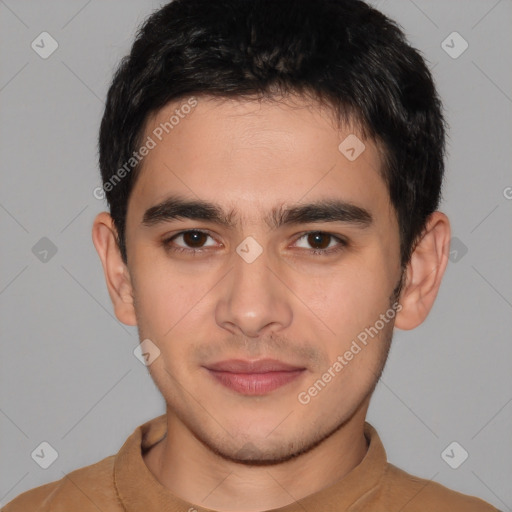 Joyful white young-adult male with short  black hair and brown eyes