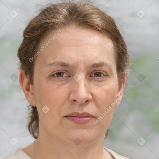 Joyful white adult female with short  brown hair and grey eyes