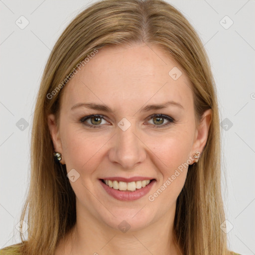 Joyful white young-adult female with long  brown hair and green eyes