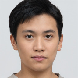 Neutral asian young-adult male with short  brown hair and brown eyes