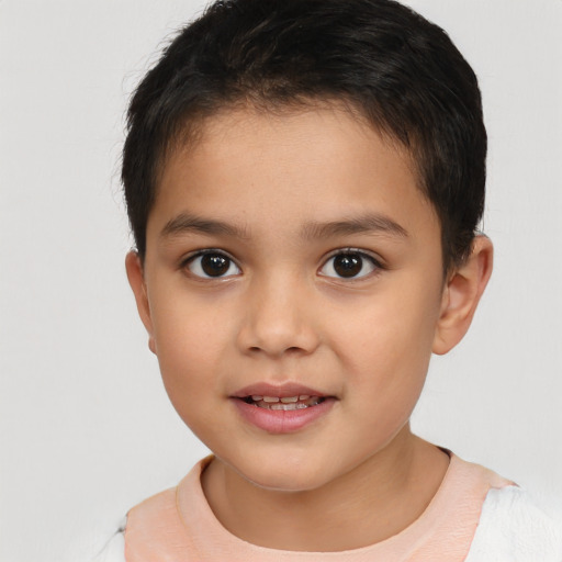 Joyful white child female with short  brown hair and brown eyes