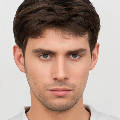 Neutral white young-adult male with short  brown hair and brown eyes