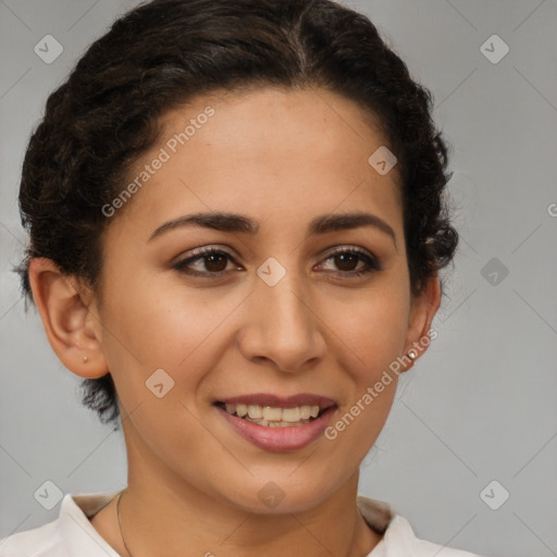 Joyful latino young-adult female with short  brown hair and brown eyes