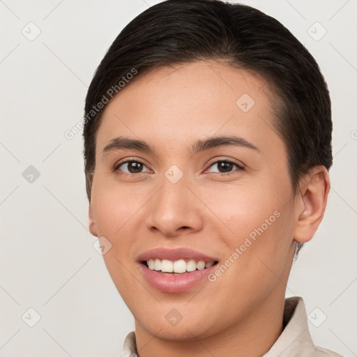 Joyful white young-adult female with short  brown hair and brown eyes